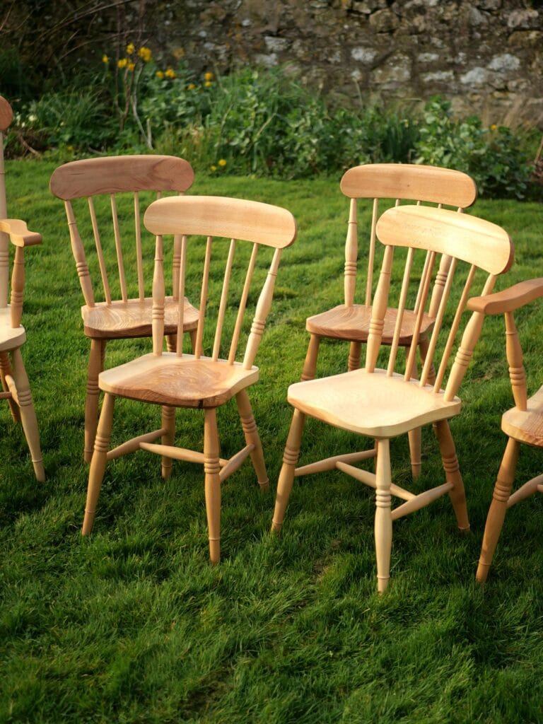 Handmade Set Of English comb back Windsor chairs in beech with ash seats.