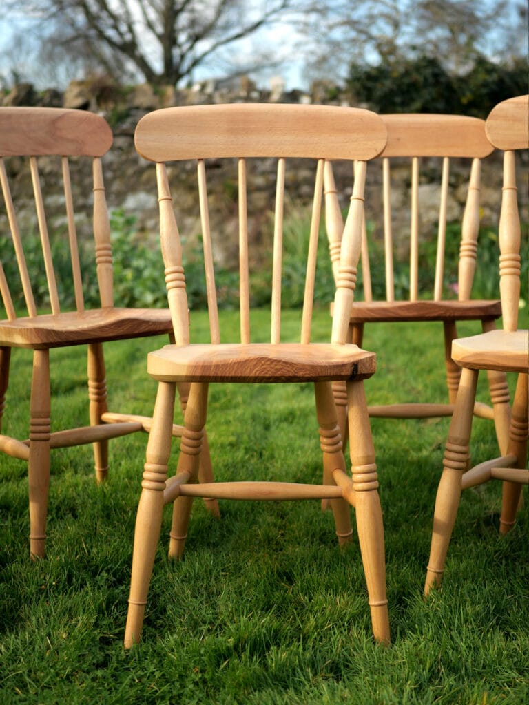 Handmade Set Of English comb back Windsor chairs in beech with ash seats.