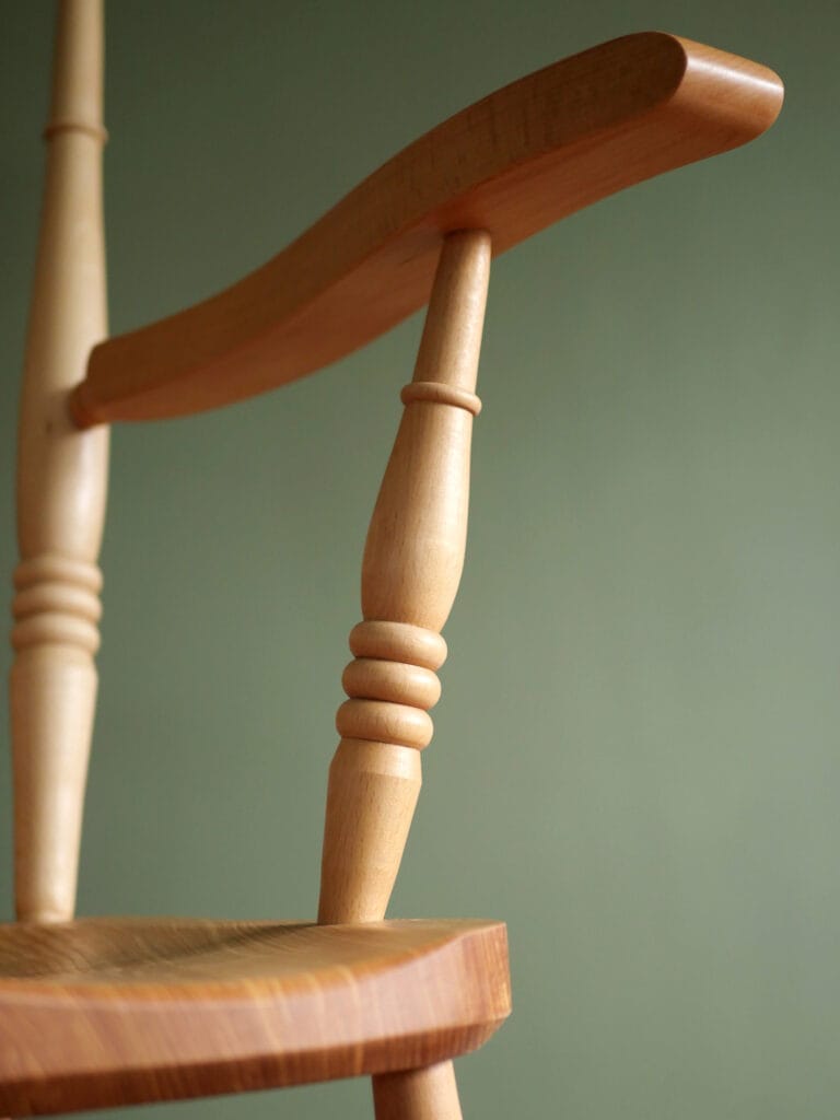 Handmade English comb back Windsor chair in beech with ash seat.