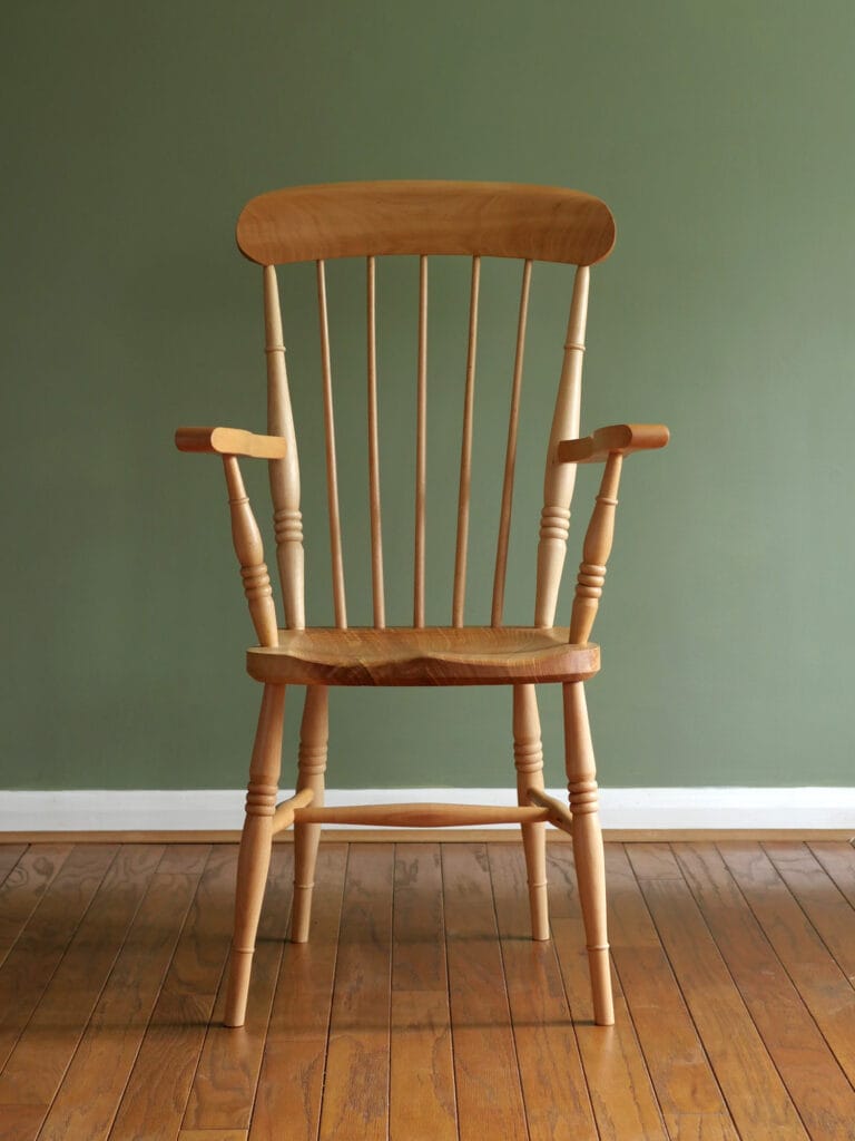 Handmade English comb back Windsor chair in beech with ash seat.