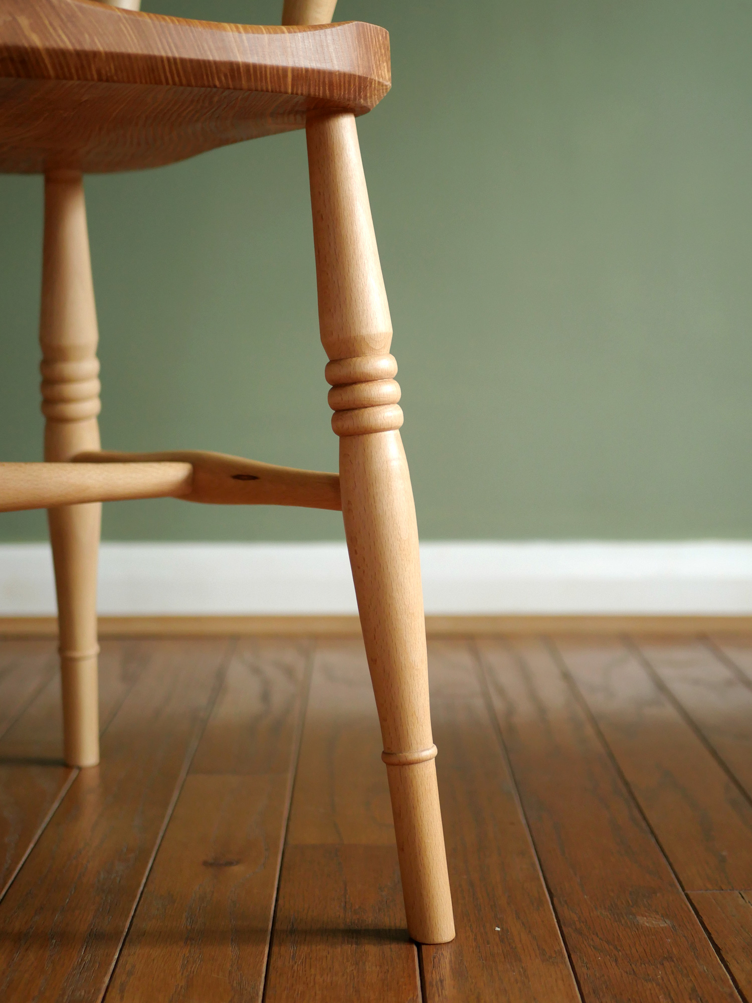 Handmade English comb back Windsor chair in beech with ash seat.