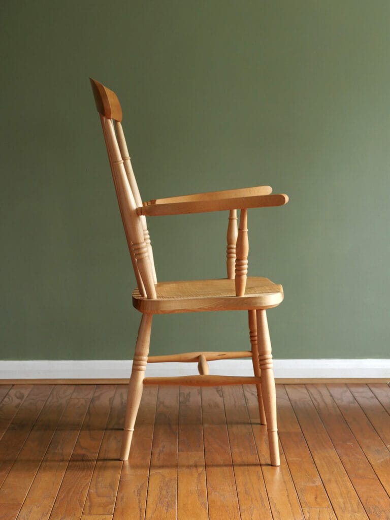 Handmade English comb back Windsor chair in beech with ash seat.