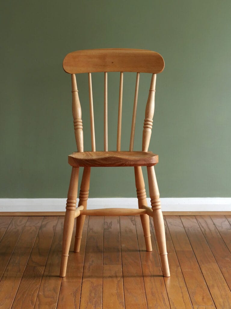 Handmade English comb back Windsor dining chair in beech with ash seat.