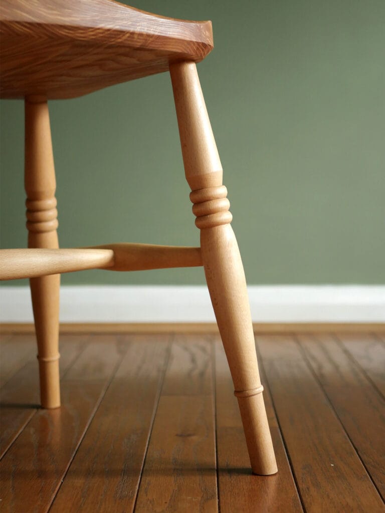 Handmade English comb back Windsor dining chair in beech with ash seat.
